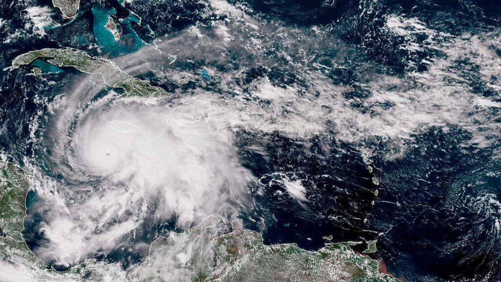 Be Wary of AI Videos as Hurricane Melissa Hits Jamaica. How to Spot a Fake satellite image provided by the National Oceanic and Atmospheric Administration (NOAA), Hurricane Melissa churns northwest through the Caribbean Sea captured at 17:00Z on October 27, 2025.