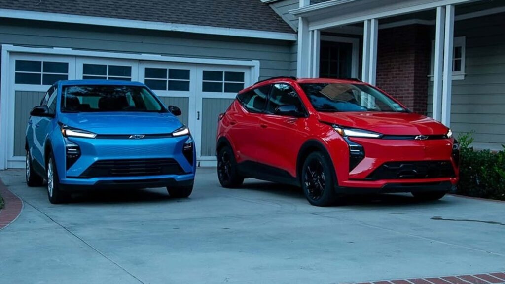 Chevy’s New Bolt Electric Car Is Truly Affordable, at Less Than $30,000 The 2027 Chevrolet Bolt in blue (left) and red sit on a driveway.
