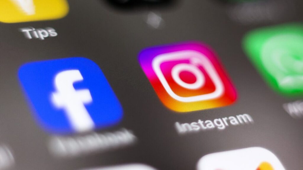 EU accuses Meta of violating content rules in move that could anger Trump Facebook and Instagram app icons on a phone screen.