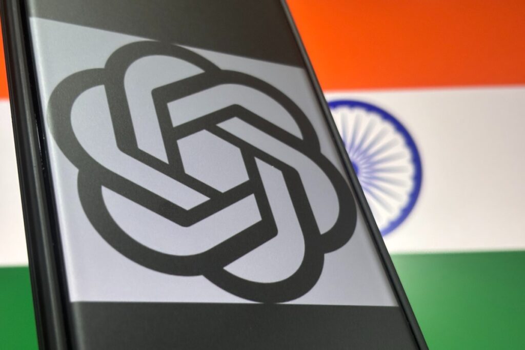 OpenAI offers free ChatGPT Go for one year to all users in India OpenAI logo over flag of India