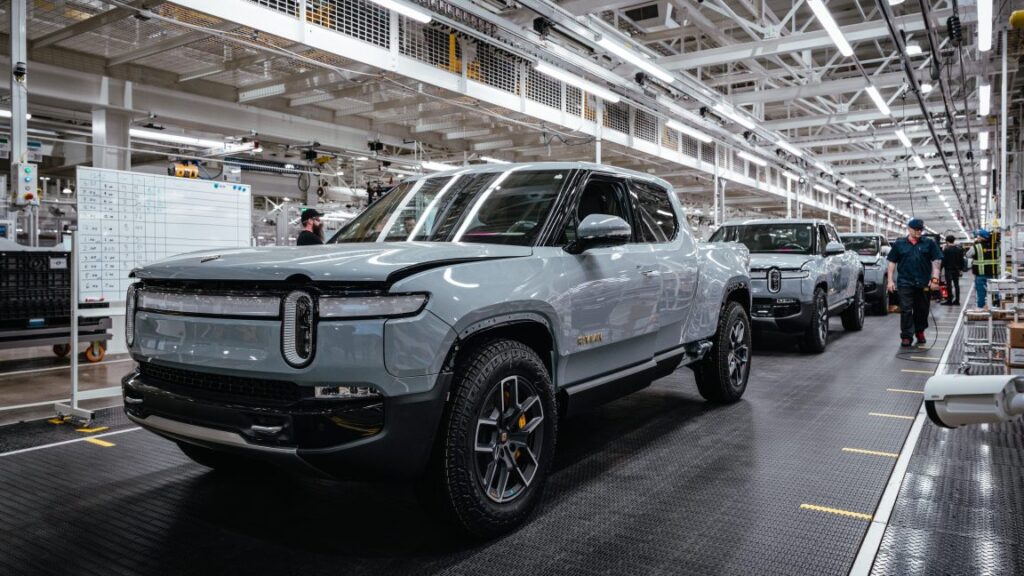 Rivian is settling $250 million lawsuit to focus on next year’s R2 EV Rivian assembly line