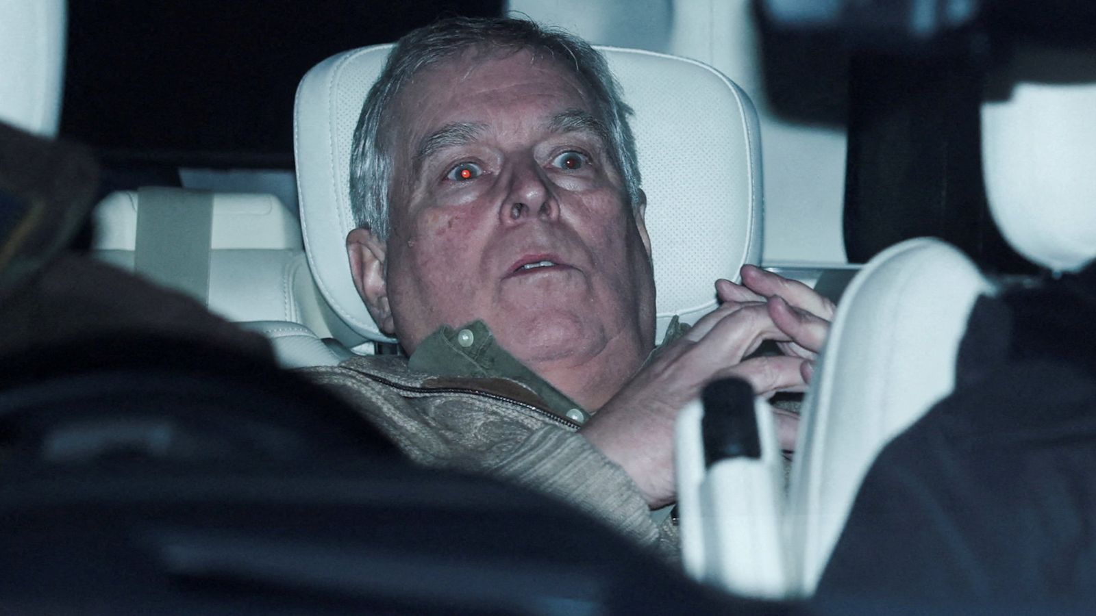 Andrew Mountbatten-Windsor after leaving a police station on his birthday. Pic: Reuters