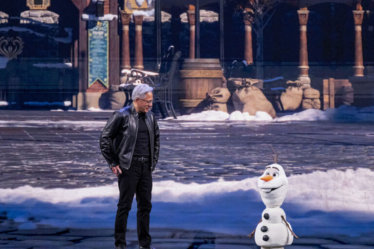 Jensen Huang, chief executive officer of Nvidia Corp., and Olaf, a robotic character from the Disney movie Frozen, during a keynote address at the Nvidia GTC conference in San Jose, California, US, on Monday, March 16, 2026. Nvidia Corp., the company at the center of an explosive build-out of AI computing, expects to generate at least $1 trillion from its Blackwell and Rubin chips through the end of 2027. Photographer: David Paul Morris/Bloomberg via Getty Images