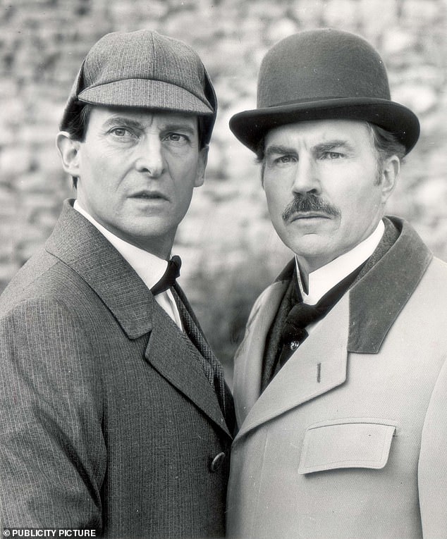 David Burke (right) is best known for his portrayal of the Dr Watson in 1980s TV series The Adventures of Sherlock Holmes, in which he starred opposite Jeremy Brett (left)