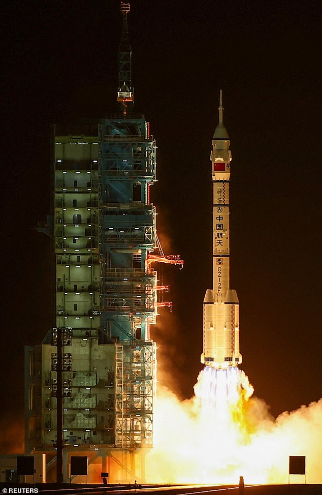 A Long March 2F rocket carrying the Shenzhou-23 spacecraft with astronauts Zhu Yangzhu, Zhang Zhiyuan, and Lai Ka-ying, who is the first astronaut from Hong Kong, blasts off