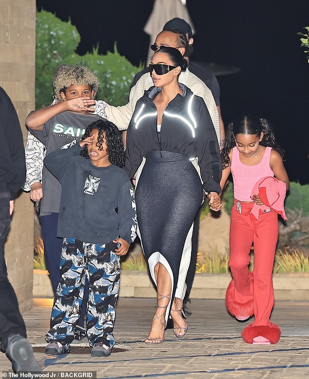 Kim Kardashian took a major step in her blossoming romance with Lewis Hamilton as he spent quality time with her children this week