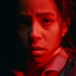 Lou Llobell as Maddie in Passenger from Paramount Pictures.
