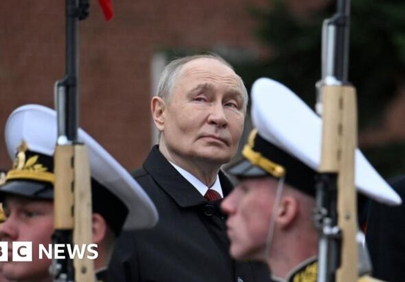Putin denounces Nato at scaled back Victory Day parade