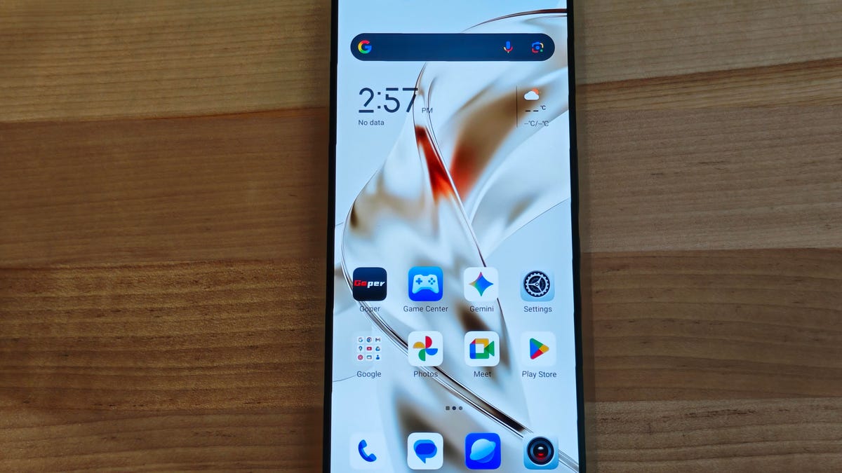 A RedMagic 11S Pro is turned on and focused on the home screen. The display goes edge to edge without a cutout.
