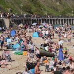 UK heatwave officially declared temperatures top 32C on hottest day of the year so far