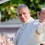 1 million people flood Madrid streets to see the pope’s flower-carpeted procession