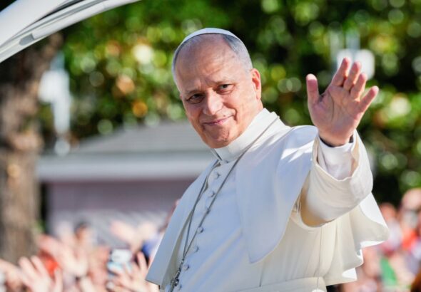 1 million people flood Madrid streets to see the pope’s flower-carpeted procession
