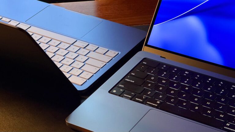 MacBook Neo and MacBook Pro kept next to each other on a table