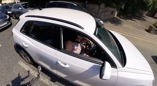 This is the moment Adrian Chapmanlaw became a 'pseudo police officer' - and stops a driver for checking Instagram at the wheel