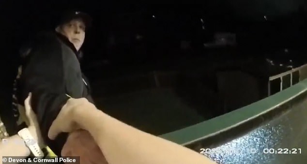 This is the terrifying moment a killer tried to throw a rookie police officer off a balcony after hitting her in the head with a bottle for saving his life