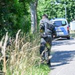 A three-month-old baby was snatched from a pram outside his home in Germany after his mother said she had briefly left him outside while carrying shopping up to her second-floor apartment. Pictured: Officers during the search
