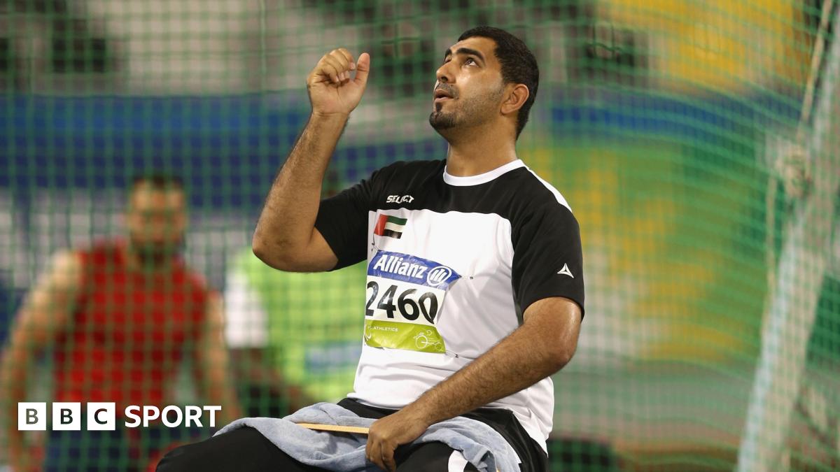 Abdullah Hayayei warming up in a shot put cage