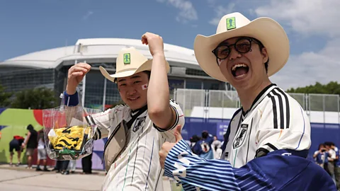 Getty Images Japanese fans in Texas are discovering cowboy hats (Credit: Getty Images)