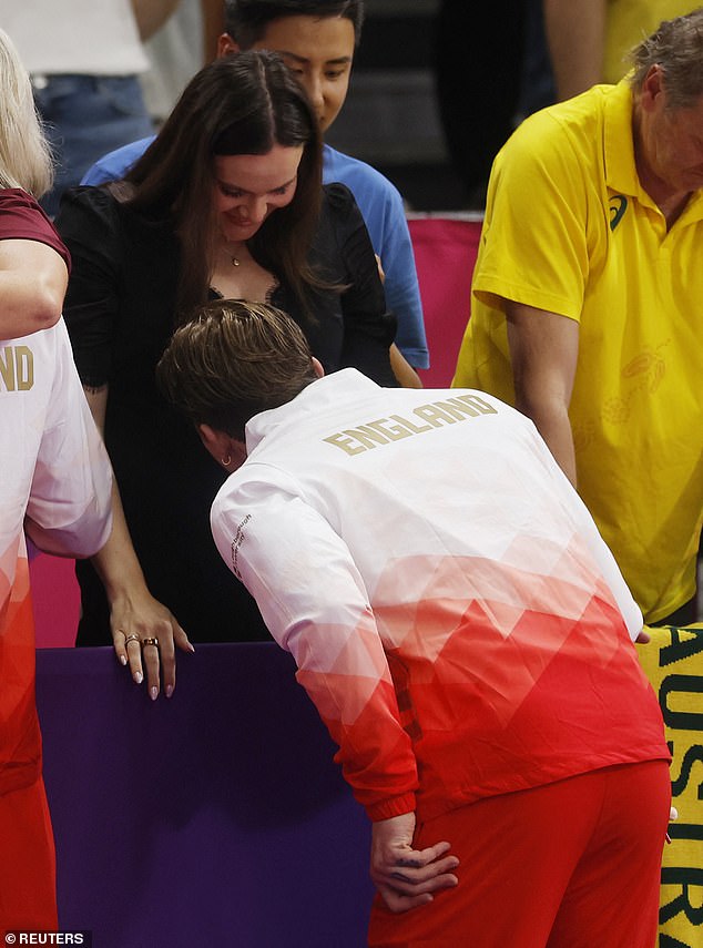 Adam Peaty kissed his pregnant wife Holly Ramsay's baby bump as he celebrated winning a silver medal for the 4x100m medley relay at the Commonwealth Games on Wednesday