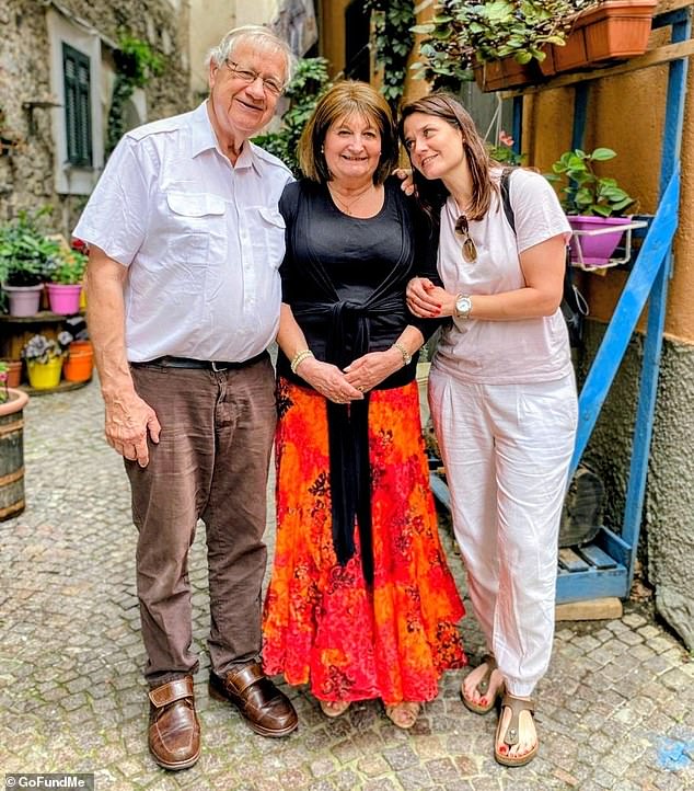 It is said to have taken three months for the NHS to start Marie's treatment after diagnosis, by which point her tumour had doubled in size (seen centre with her husband and daughter)