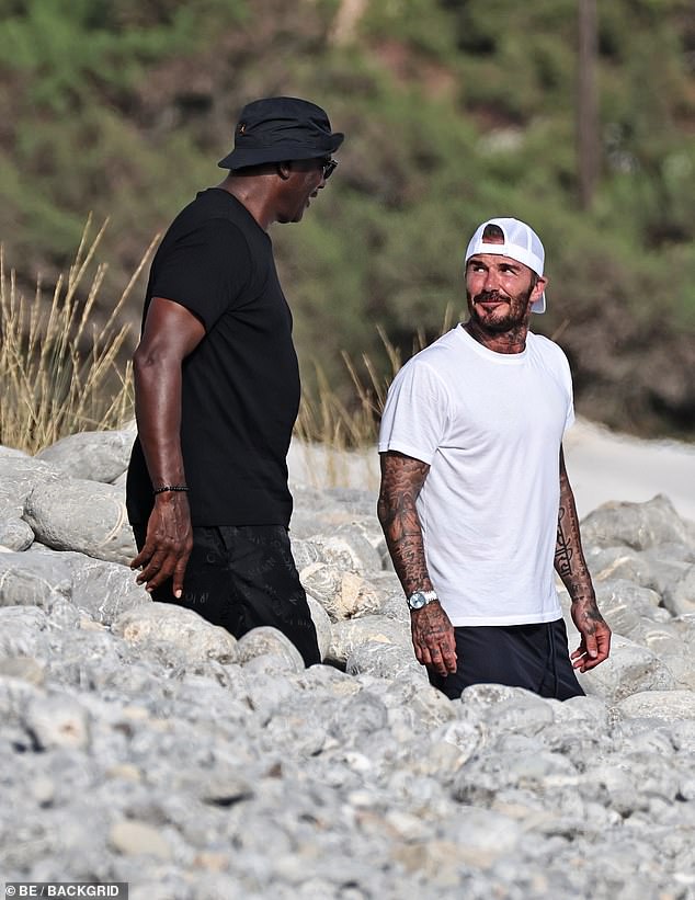 It was a meeting of two sporting minds on the coast of Ibiza, as David Beckham joined basketball legend Michael Jordan for a swanky lunch