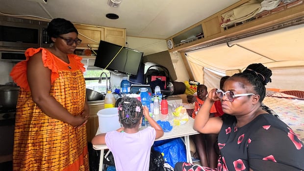 Montreal duplex dispute leaves family in a trailer, tenants facing uncertainty