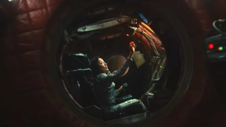 woman in cockpit of a small futuristic aircraft