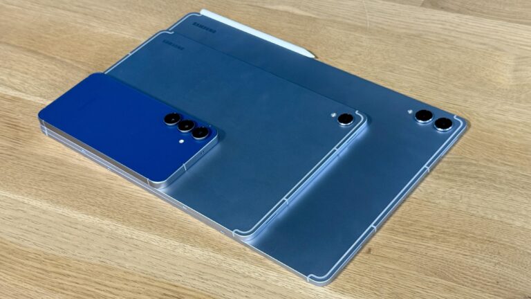 The Galaxy S25 FE, Galaxy Tab S11 and Galaxy Tab S11 Ultra on a wooden table.