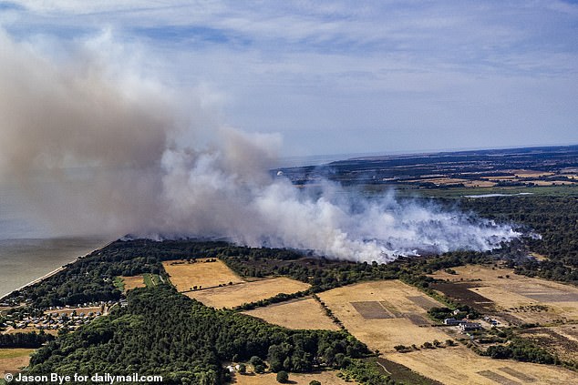 Aerial photo shows a fire ravaging an area the size of 14 football pitches in Suffolk