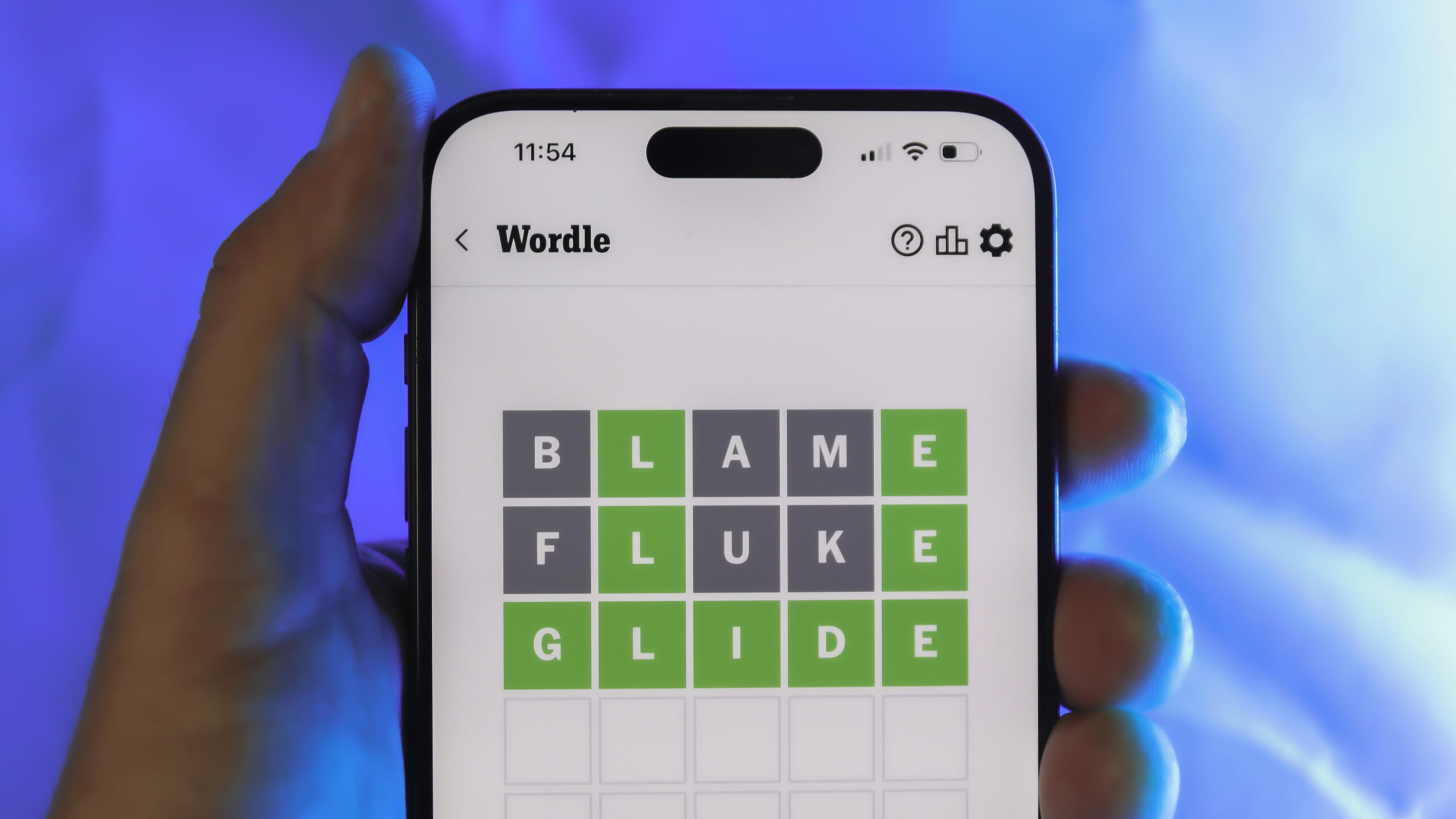 a completed Wordle puzzle on a phone