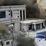 CCTV shows people running as mud and water destroys buildings in Gyirong, Tibet