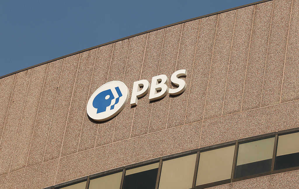 A sign for the Public Broadcasting Service (PBS) is seen on its building headquarters