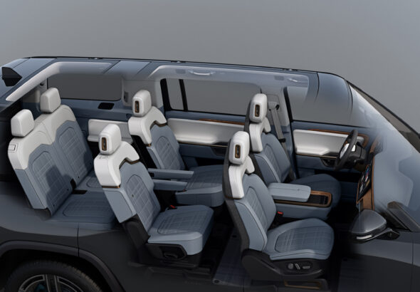 Render of Rivian R1S (2027) interior cut away to show the new second-row captain's chairs
