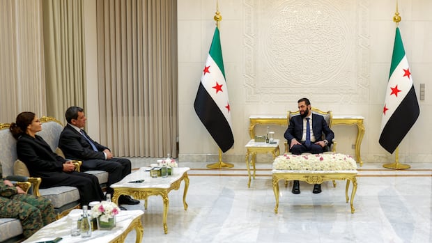 Syrian president names former commander of Kurdish-led fighting force as adviser