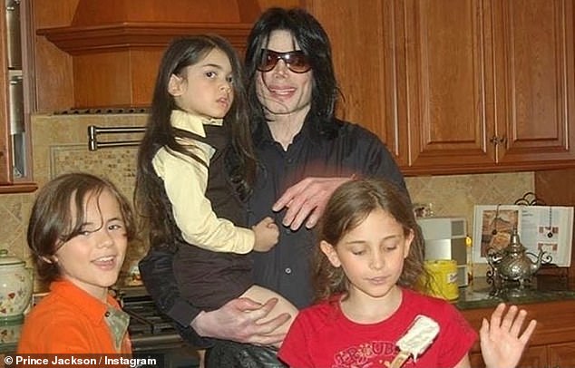 Inside the turbulent lives of the Jackson children and their varied fates as a rift over the Michael biopic threatens to tear them apart (Prince, Bigi and Paris pictured with Michael)