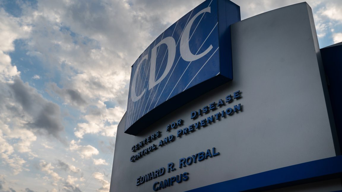 Huge facade for CDC headquarters against a beautiful sky.