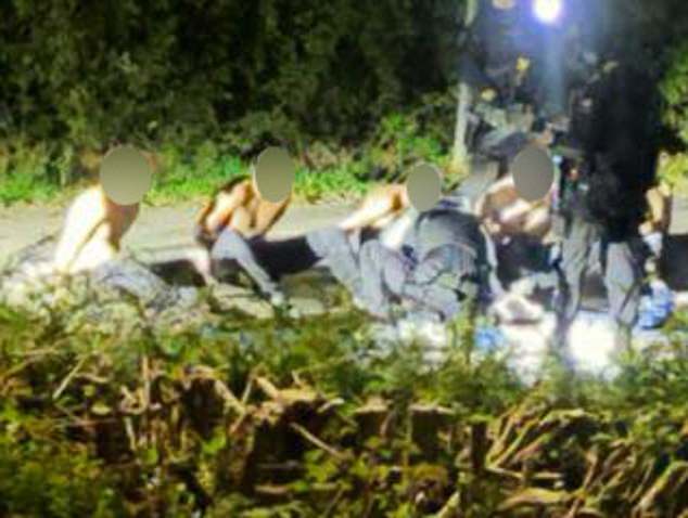 Five men were pictured as police arrested them on terror charges near RAF Fairford in Gloucestershire