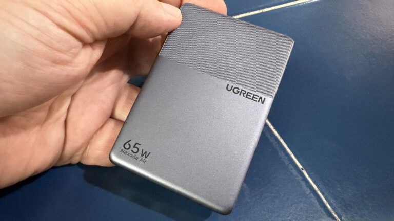 I finally found a 65W charger that's thinner than my wallet and fits behind the couch