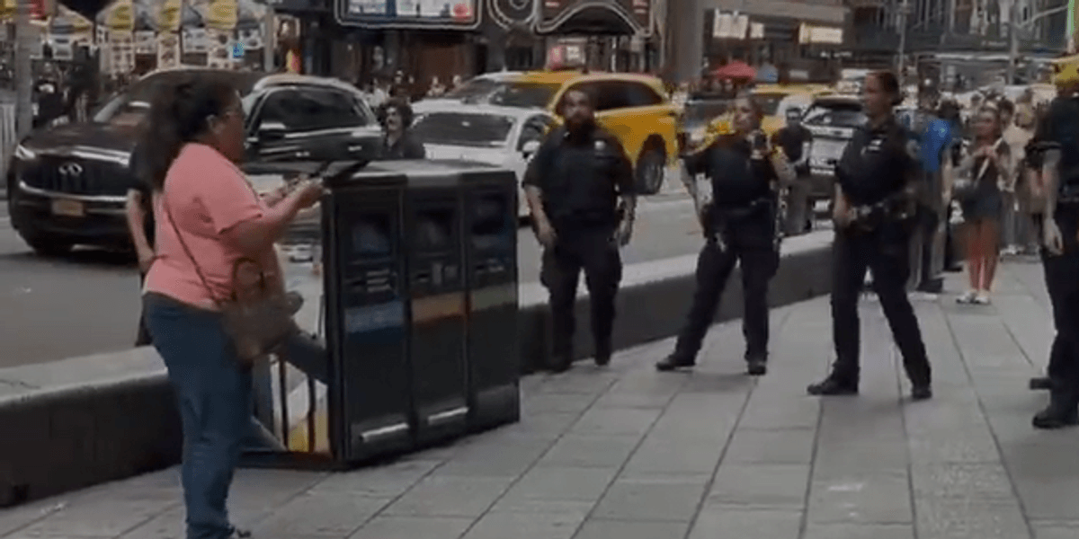 New York woman stabs two before being shot dead by police in Times Square