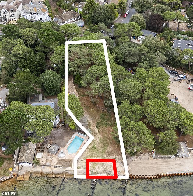 In 1998 millionaire Simon Bowden paid £820,000 for this plot of land on the Sandbanks peninsula, which came with a delapidated boat house that was built in the 1920s. The site where the old boathouse stood is marked in red