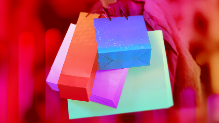 colorful gift bags on a red background