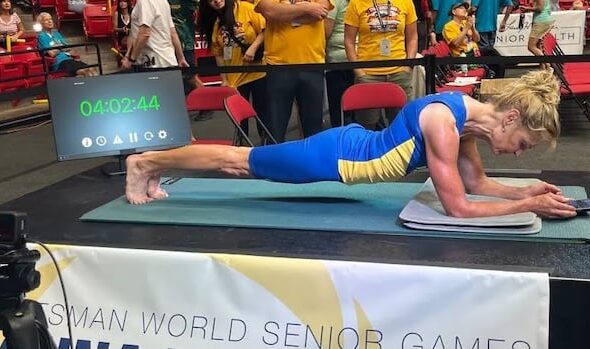Alberta woman, 61, breaks her own world record by planking for 5 hours