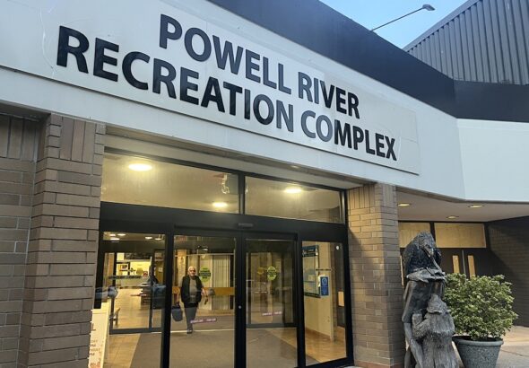The exterior of the Powell River Recreation Complex at dusk.